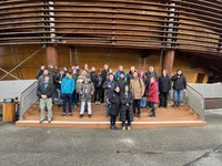 Group photo in front of the Globe of Science and Innovation