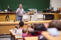 Here we go! Prof. Klaus Desch takes the children on a journey to the smallest building blocks of the universe.